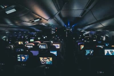Nighttime photo taken inside an airplane