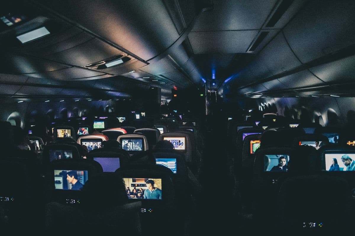 Nighttime photo taken inside an airplane